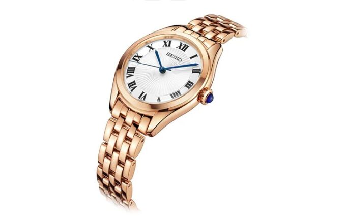 Modische Quarzuhr mit blau-weißem Zifferblatt, roségoldfarbenem Armband und Wasserdichtigkeit bis 5 bar