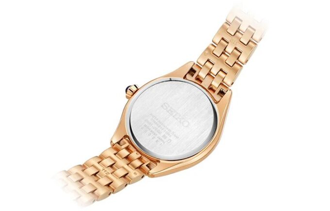Modische Quarzuhr mit blau-weißem Zifferblatt, roségoldfarbenem Armband und Wasserdichtigkeit bis 5 bar