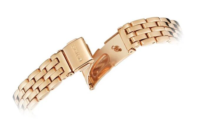 Modische Quarzuhr mit blau-weißem Zifferblatt, roségoldfarbenem Armband und Wasserdichtigkeit bis 5 bar